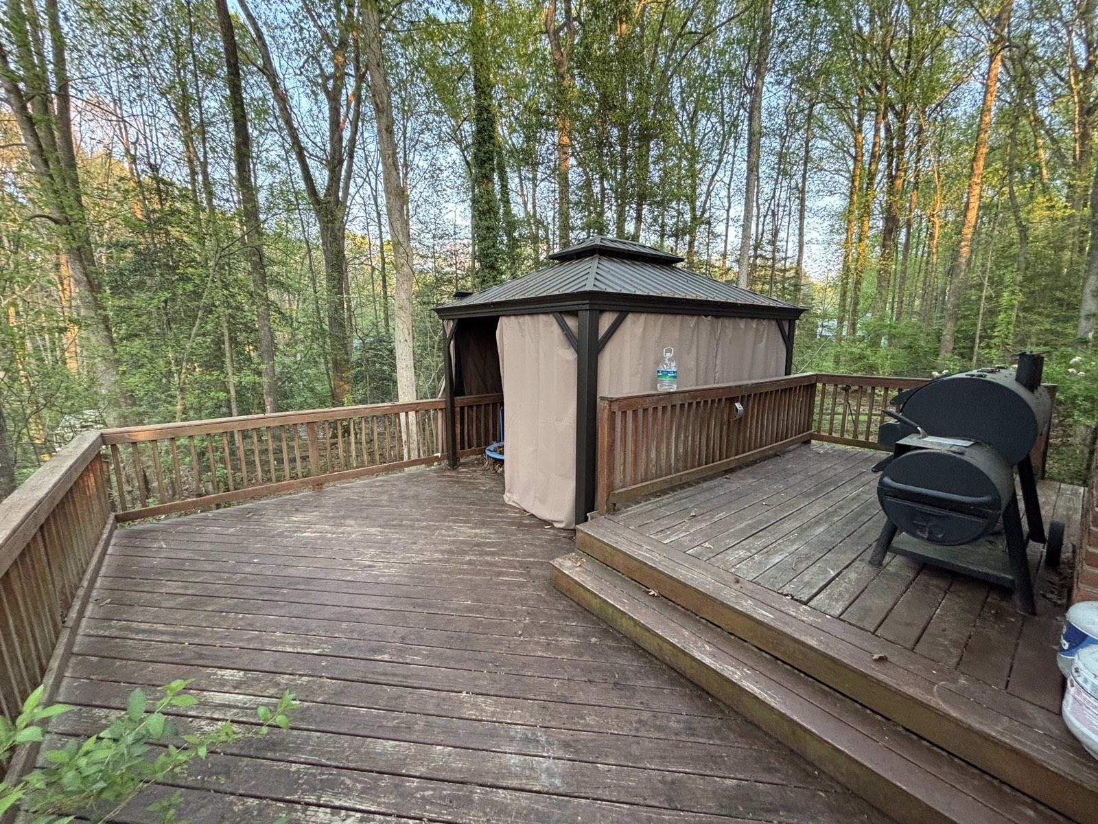 Back deck with gazebo after cleanup